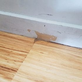 Chipped hallway skirting boards