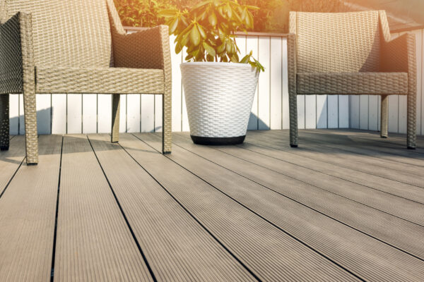 Stylish composite decking in a modern UK garden by AllPanels