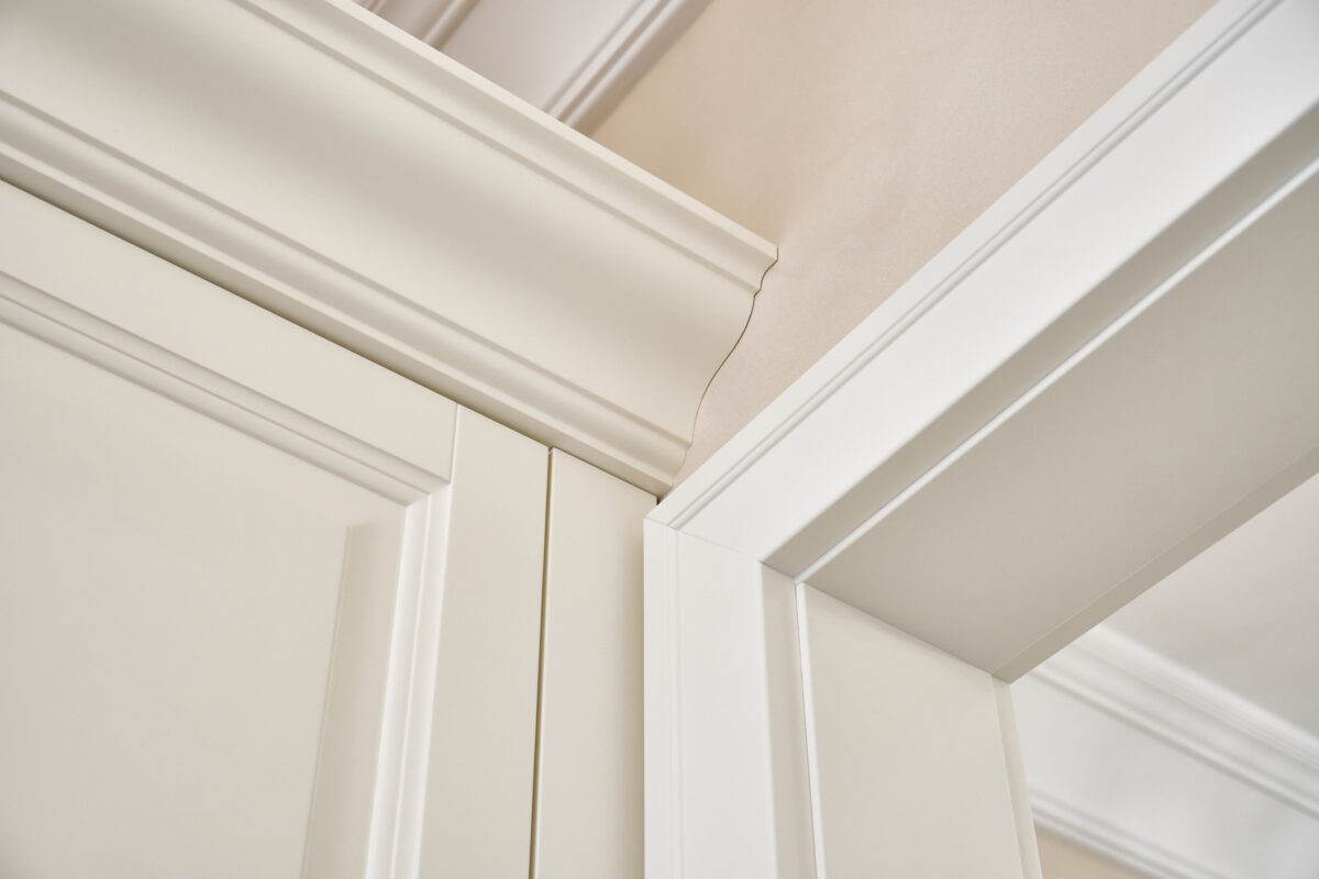 PVC architrave around a door frame in modern interior