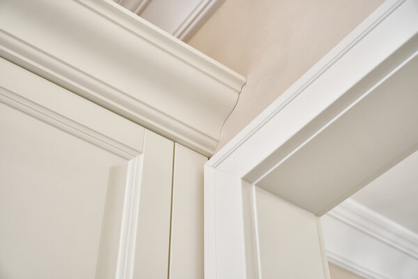 PVC architrave around a door frame in modern interior